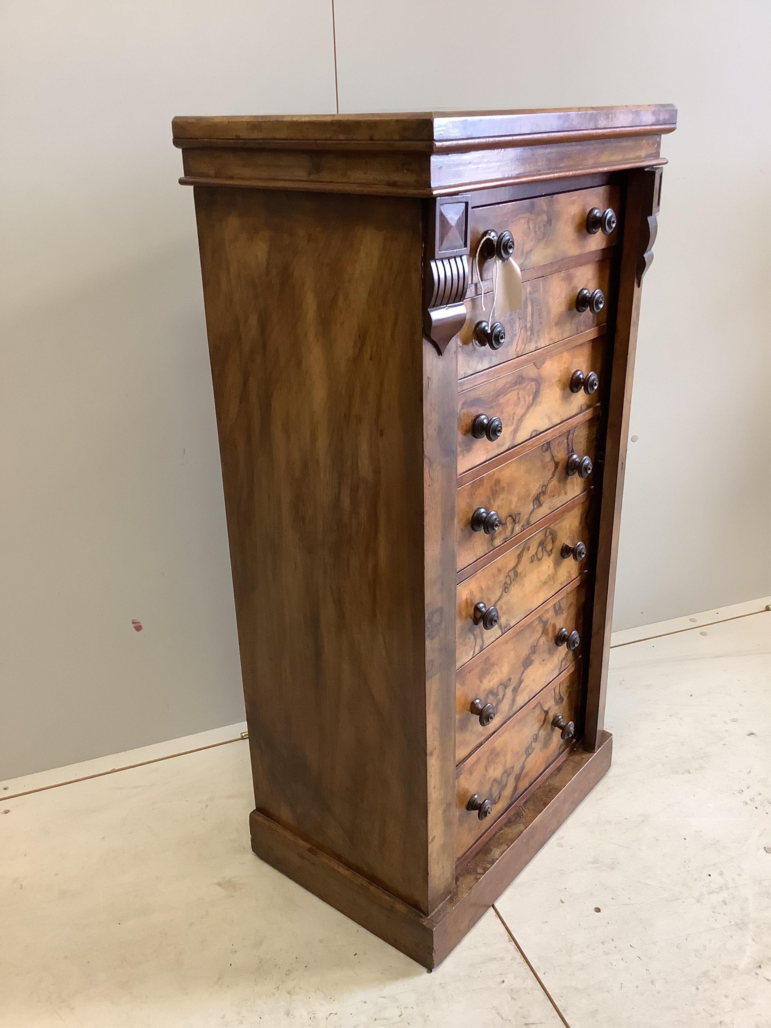 A Victorian walnut Wellington chest, width 52cm, depth 37cm, height 108cm. Condition - fair to good